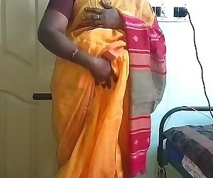 desi indian horny tamil telugu kannada malayalam hindi cheating wife vanitha wearing orange colour saree showing big..